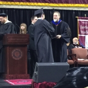 3Corbin campus graduate Timothy Vanzant-Bailey accepts his diploma from Dr. Kras