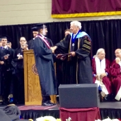 Ankit Pate, former Corbin campus student accepts his diploma from Dean Ault 12-2014.