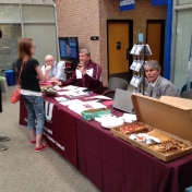 Manchester Campus Director Terry Gray and CJS Regional Campus Coordinator Stephen Kappeler speak to visitors at the Cumberland Campus Open House 4-20-2015