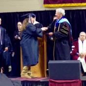 Danielle Fisher Manchester campus student accepts her diploma from Dean Ault 12/2014.