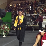 Hazard Regional Campus student Carolyn Williams returns to her seat after accepting her diploma at the CJS Commencement 5-16-15