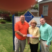 Regional Campuses' APS & LAE student organizations' Mr. Skyler Tylor Mills and Mr. Russell McKay present $250.00 check to Mrs. Mary Schild Director of Sunrise Children Services 5-12-15.  _2